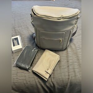 Fawn design diaper bag brand new never used all attachments still sealed.